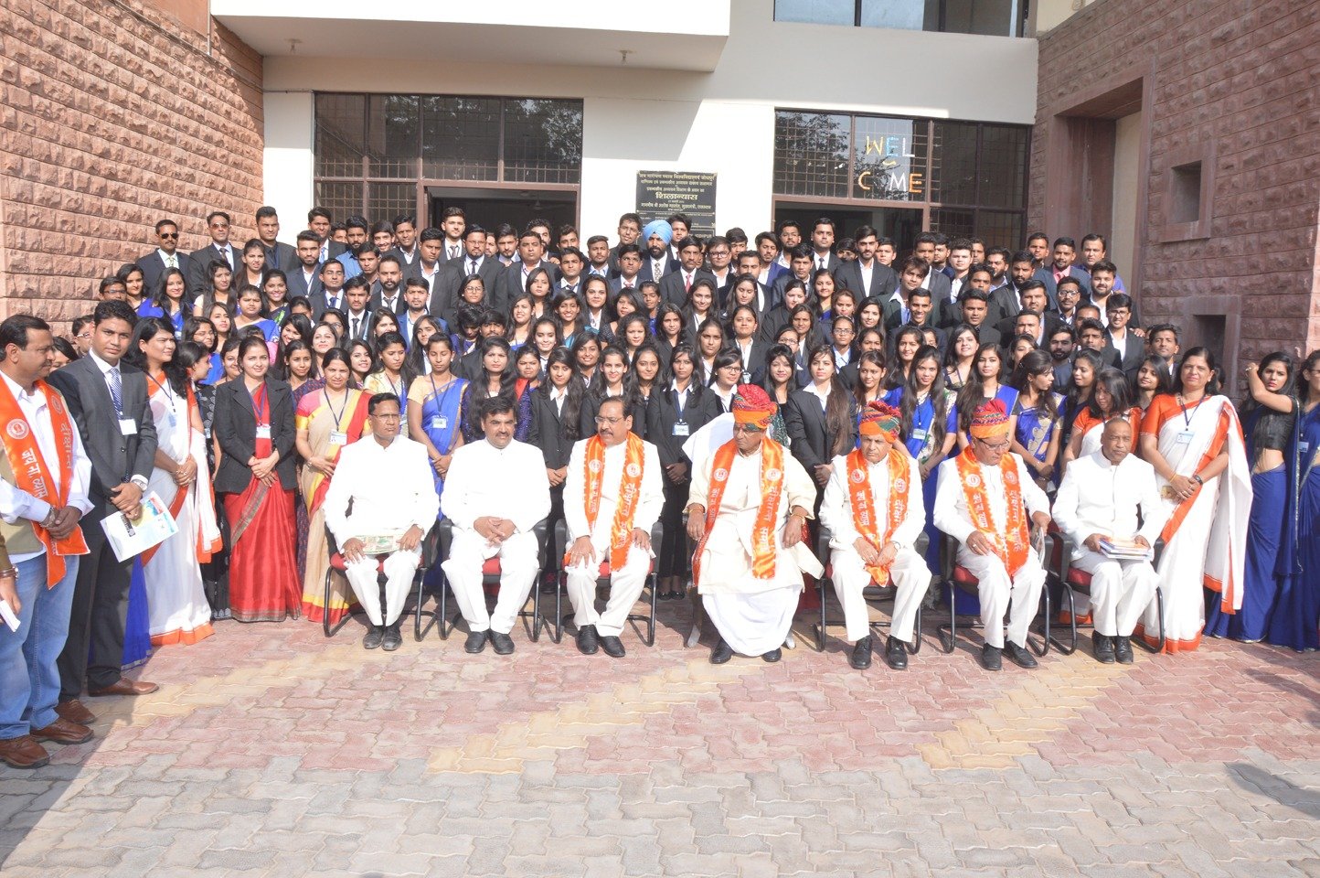 Large group photograph during a special visit to DMS.